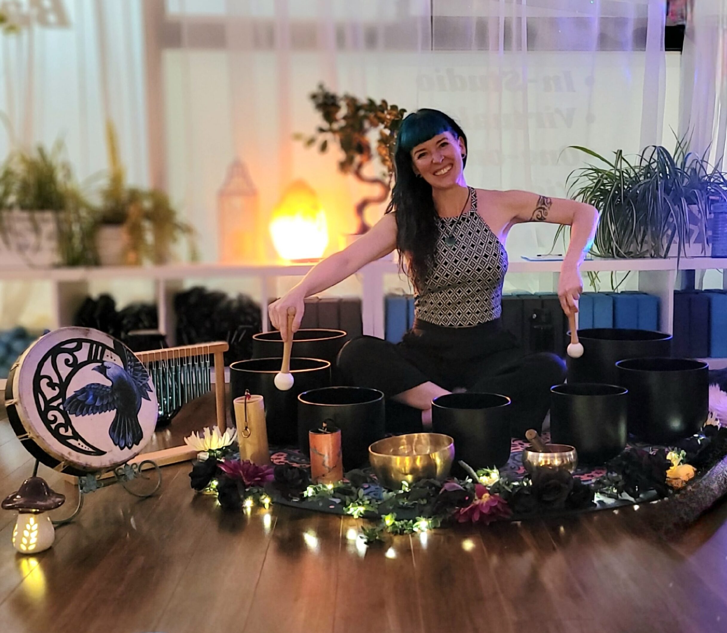 Sound healing session with crystal bowls at SoulSync Alchemy wellness sanctuary.